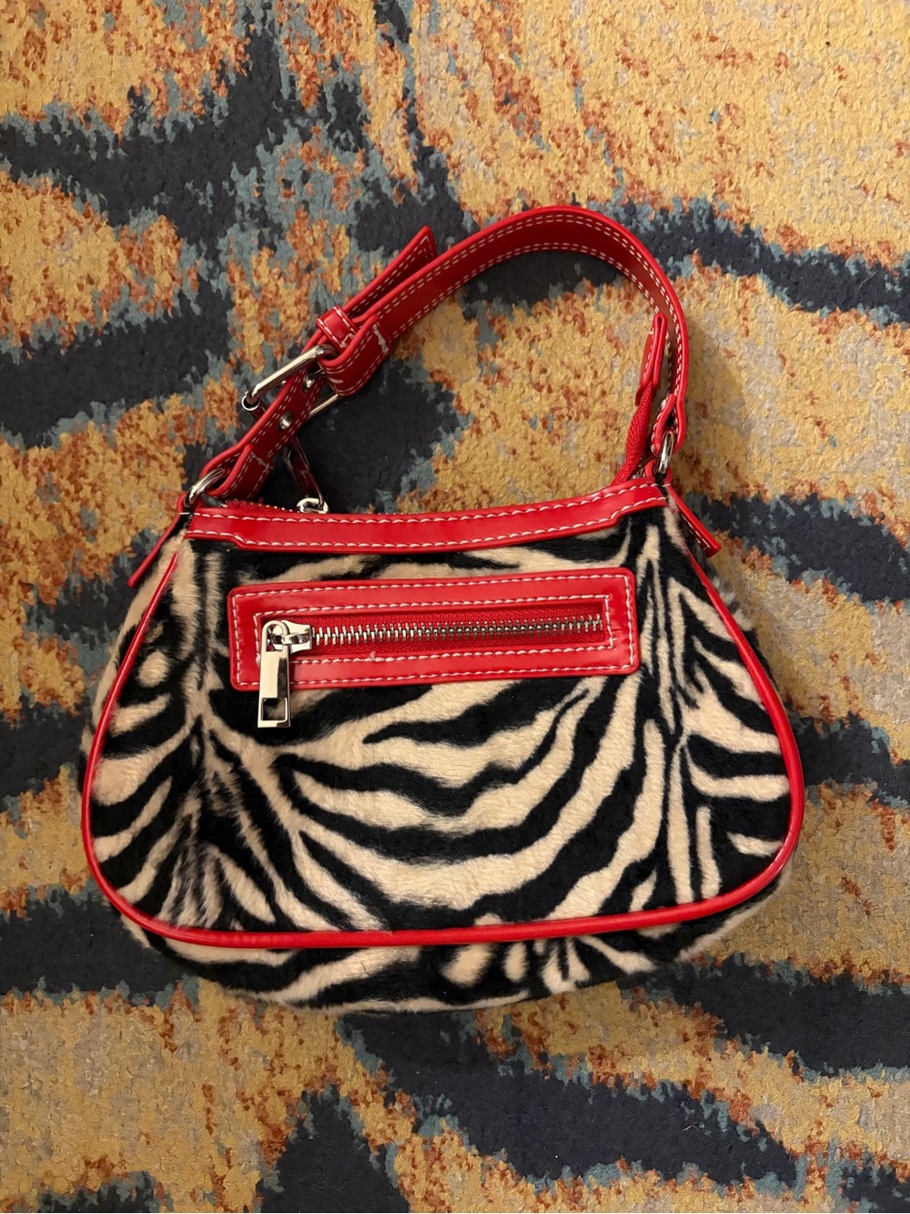vintage zebra print handbag with red trim
#y2k #zebraprint
